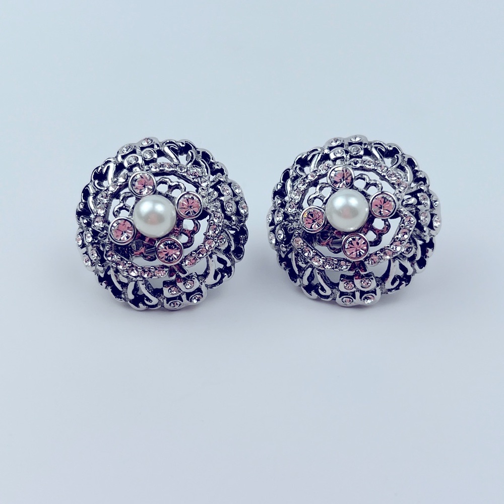 Signed Givenchy Clip on earrings with rhinestones